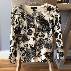 White and black floral pattern sweater